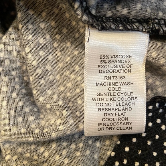 Cable & Gauge black blouse with peekaboo long sleeves. - Picture 5 of 5